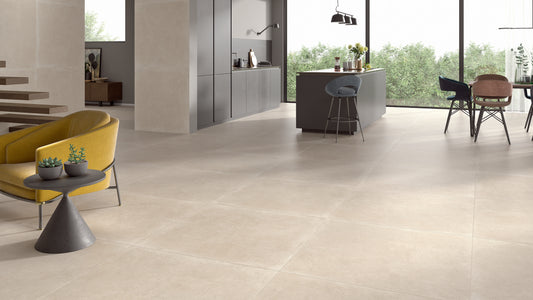 Suelo porcelanico gran formato 100x100 cm Caspio en salon de diseno